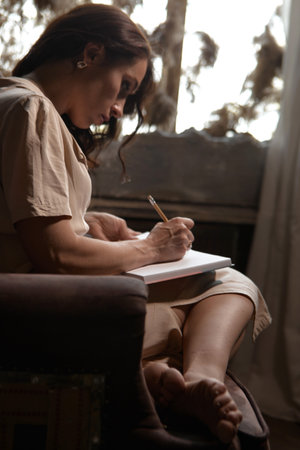 The process of writing tasks for the day. effective time managementの写真素材
