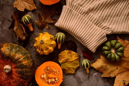 Pumpkin, leaves, spices on the background. Autumn concept. Top view.の写真素材