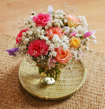 Bouquet of beautiful multicolored roses, a studio photoの写真素材