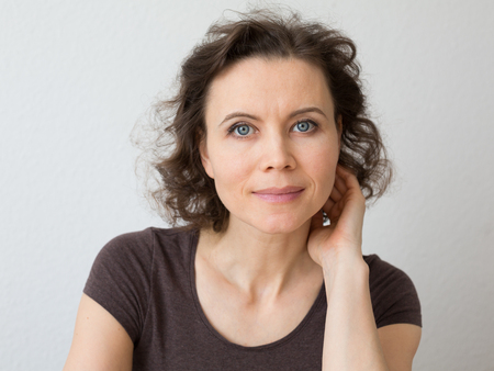 Close-up natural portrait of woman 30-40 years oldの写真素材