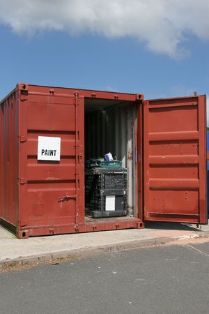 Red metal paint recycling container.