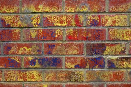 Urban graffiti on a red brick wall.のeditorial素材
