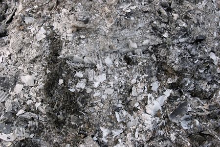 Abstract ash remains of a wood and paper fire.