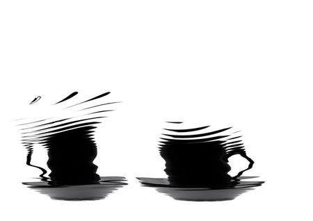 Abstract in grey and black of two cups and saucers set against a white background.の写真素材