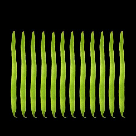 Abstract design of runner beans, over black background.の写真素材