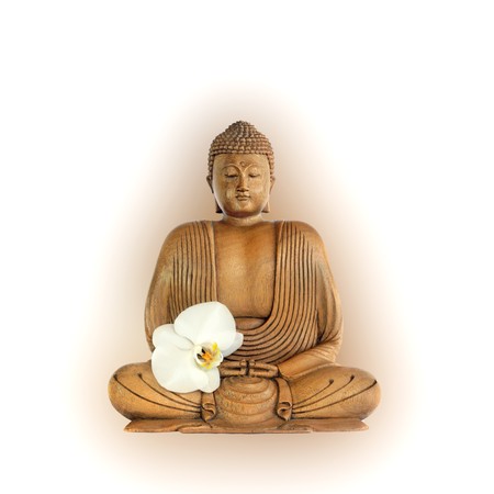 Buddha with aura and eyes closed in prayer with an orchid flower, over white background.の写真素材