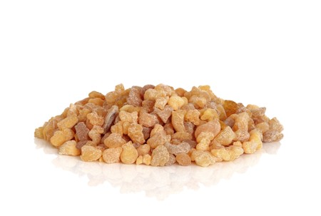 Frankincense olibanum resin  isolated over white,background with reflection.の写真素材