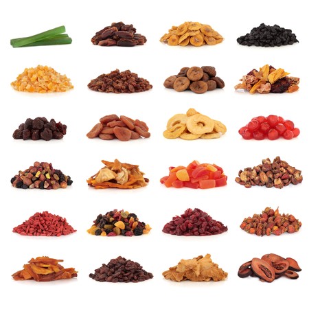 Large collection of dried and candied fruit for snacks and culinary use, isolated over white background.の写真素材