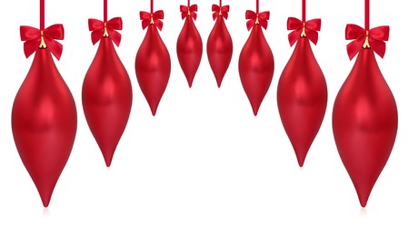 Christmas droplet shaped red baubles, isolated over white background with reflection.の写真素材