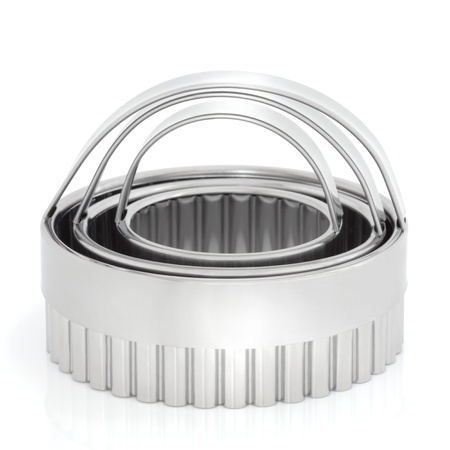  Circular cookie cutter in stainless steel isolated over white background.の写真素材
