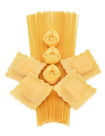 Spaghetti, tortellini and ravioli pasta in an abstract design on white background の写真素材