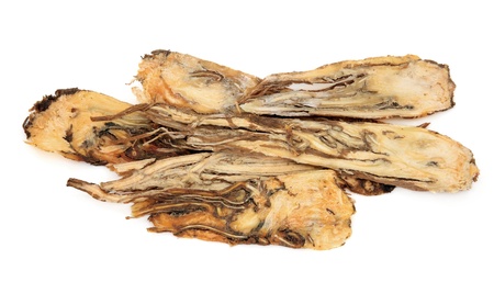 Angelica root used in traditional chinese herbal medicine  over white background   