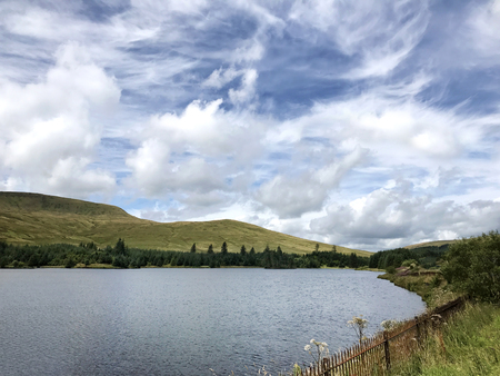 Cantref reservoir in the Taff Fawr valley Wales, United Kingdom showing the north end located in the Brecon Beacons National Park.の写真素材