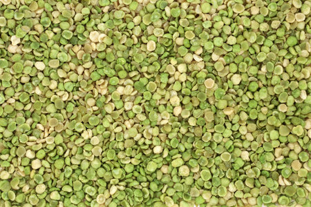 Roasted green peas high protein health food forming a background. High in dietary fibre, vitamins &...