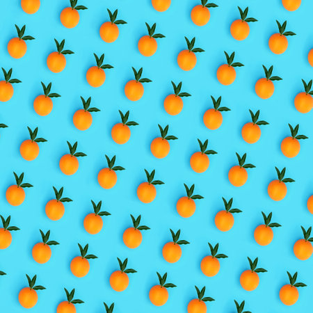 Healthy orange citrus fruit design with leaf sprigs, high in flavonoids, antioxidants and vitamin c for immune system boost. Abstract isometric composition for health food concept on blue background.の写真素材