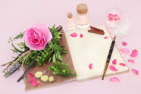 Love potion magic spell concoction preparation with hemp notebook, old ink nib pen, witches bundle,...