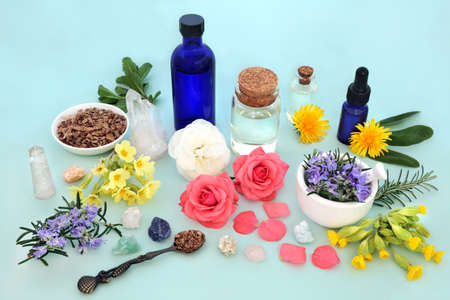 Herb, flower and wildflower ingredients for alternative medicine treatments. Natural pagan traditional health care remedy with essential oils, crystals.の写真素材