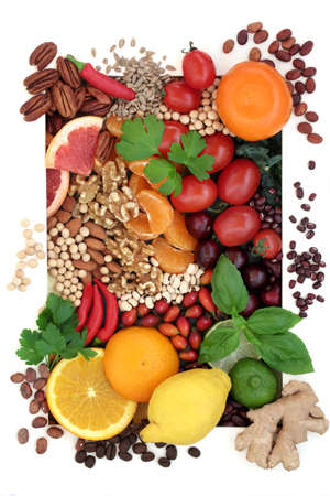 Vegan health food high in flavonoids, antioxidants, lycopene, anthocyanins, vitamins, protein, bio flavonoids minerals, fibre. Vegetables, fruit, herbs, coffee, seeds, grains. White background border.の写真素材