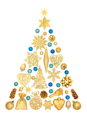 Christmas tree shape decoration with gold and blue bauble decorations and ornaments. Festive concept symbol for Xmas holiday season. On white background.の写真素材