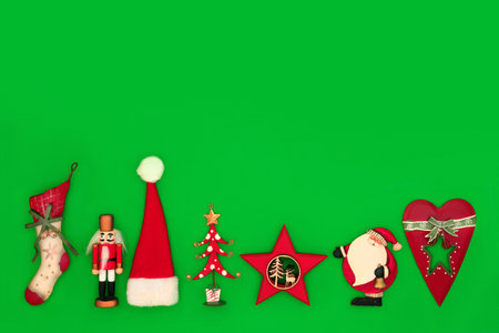 Retro rustic Christmas tree wooden metal and cloth decorations. Eco friendly minimal design for Xmas and New Year holiday season on green background.の写真素材
