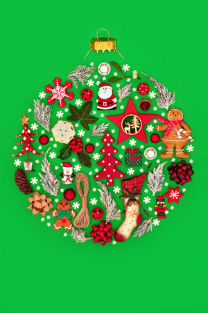 Christmas tree round shape bauble decoration concept with natural decorations, fauna, food, symbols and snowflakes. Environmentally friendly design on green background.の写真素材