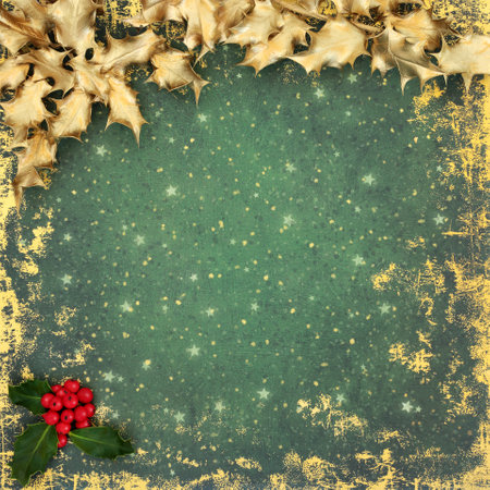 Christmas Winter and New Year decorative background with natural holly and red berries with gold leaves on grunge green background. Traditional Xmas border for the holiday season.の写真素材