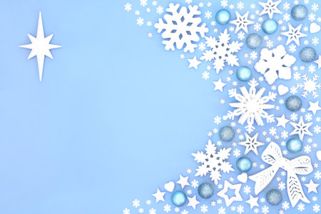 Christmas snowflake, bow and tree bauble decorations with star of Bethlehem festive background design. Magical fantasy symbols for winter, Xmas and New Year holiday Season.の写真素材