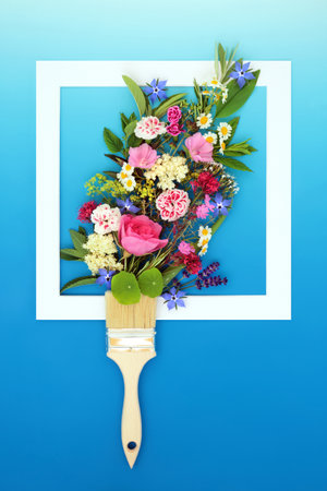 Painting with paintbrush summer flowers, herbs and edible wildflowers inside square frame. Surreal concept minimal nature food herbal medicine and design on gradient blue white background.ï¿½の写真素材
