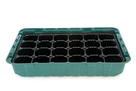 Seed tray module for sowing seeds isolated on white background. Gardening equipment green and black using eco friendly recycled plastic. Isolated on white background.の写真素材