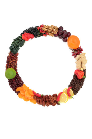 Healthy nourishing food wreath with foods high in nutrients. High in flavonoids, antioxidants, anthocyanins, vitamins, proteins, minerals, fibre. Good health concept. On white.の写真素材