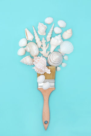 Abstract art seashell paintbrush design on pastel turquoise background. Nature sea life fun surreal summer painting composition.の写真素材