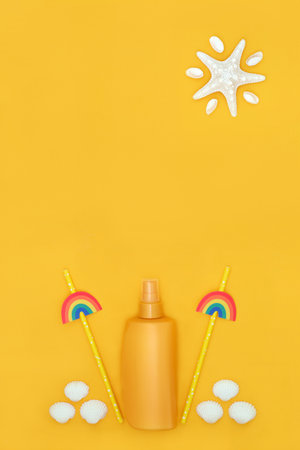 Suntan lotion for summer skincare protection with rainbow drinking straws, cockle shells and...