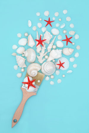 Painting with seashells, pearls and red starfish. Surreal art paintbrush design on pastel blue background. Summer nature sea life fun abstract composition.の写真素材
