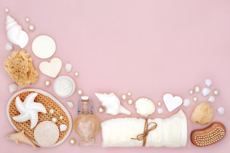 Natural and pure skincare beauty treatment spa products on pink background with assorted body care accessories for beautiful skin. With decorative oyster pearls.の写真素材