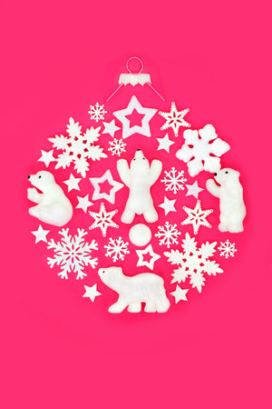 North Pole Christmas abstract white bauble decoration concept. Festive round shape symbol for holiday season, greeting card, gift tag, label on pink background.の写真素材