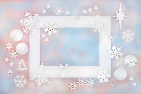 Christmas fantasy north pole magical theme with bauble ornaments on blue pink sky background white...