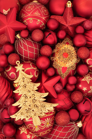 Christmas tree with red gold bauble decorations abstract background. Festive abstract Merry Christmas traditional design for greeting card.の写真素材