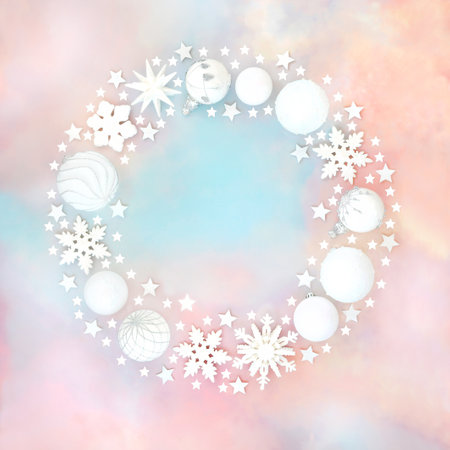 Christmas fantasy white bauble wreath decoration. Abstract on rainbow sky cloud background. Festive North pole theme for greeting card, gift tag, invitation.の写真素材