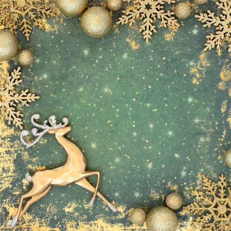 Christmas gold reindeer and sparkling bauble north pole theme on grunge green background. Merry Christmas abstract frame for greeting card, Noel, Yule.の写真素材