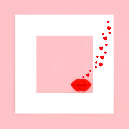 Luscious red lips with decorative heart confetti on pink background with white square frame. Abstract surreal fun Valentines day, birthday, anniversary design.の写真素材
