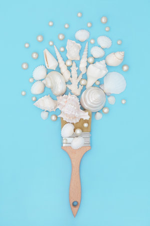 Surreal art seashell and oyster pearl paintbrush design on pastel turquoise background. Nature sea life fun abstract summer painting composition.の写真素材