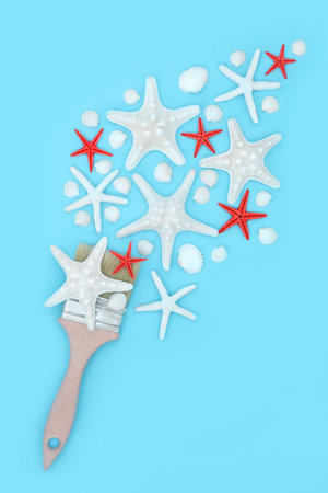 Surreal seashell painting abstract art with starfish and cockle shell splash design on blue background. Nature sea life fun summer paintbrush composition.の写真素材