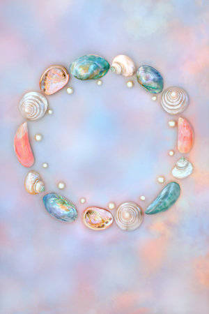 Shell and pearl abstract wreath with collection of shells on rainbow sky background. Natural summer nature design, beach and seaside art.の写真素材