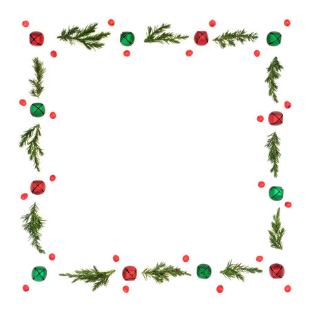 Christmas holly berry, juniper fir and bell bauble background border. Minimal red and green decorative festive frame for greeting card, invitation, gift tag.の写真素材