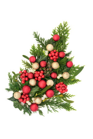 Christmas gold, red bauble bulb decorations with winter holly, mistletoe, ivy, cedar fir, pinecones on white backgound border. Festive decorative design for holiday season.の写真素材