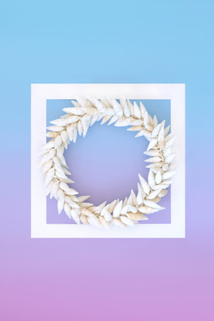 Auger seashell wreath with white square frame on gradient blue purple background. Decorative nature marine life symbol for greeting card, gift tag, label.の写真素材