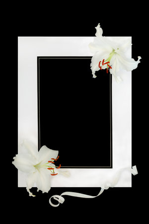 White lily flowers, ribbon and frame on black. Minimal remembrance deepest condolences background RIP design for funeral or order of service card.の写真素材