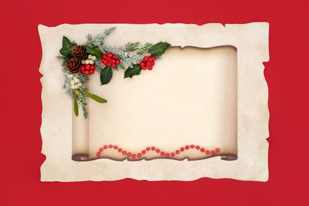 Christmas paper scroll on parchment paper on red with nature flora of holly, ivy, mistletoe, snow fir, beads. Party invitation or letter to Santa retro design.の写真素材