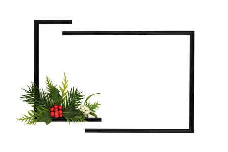 Abstract festive Christmas black split frame with holly, fir, mistletoe on white. Minimal traditional winter green flora and red berries. Seasonal design, holiday greeting card.の写真素材