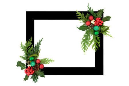 Christmas winter holly berry and flora  and bauble decorations on white background black frame border. Festive vibrant design for holiday season, card, invitation, gift tag.の写真素材